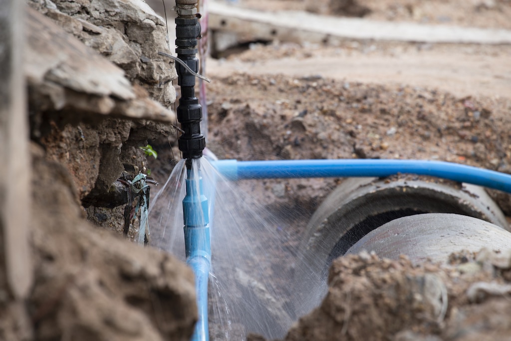 Water pipe break, in need of Sewer and Water Line Service.