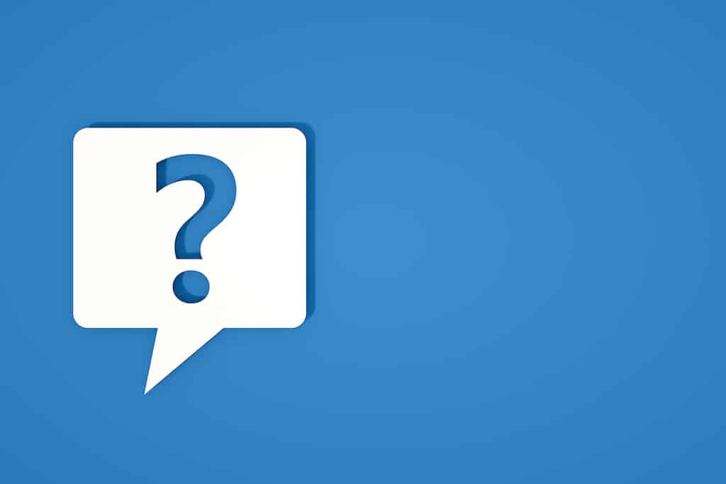 Blue background with white speech bubble and question mark. | water softener