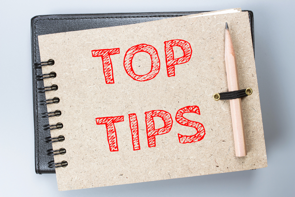 Notepad with pencil reading 'top tips' about Storm Drain Cleaning Services
