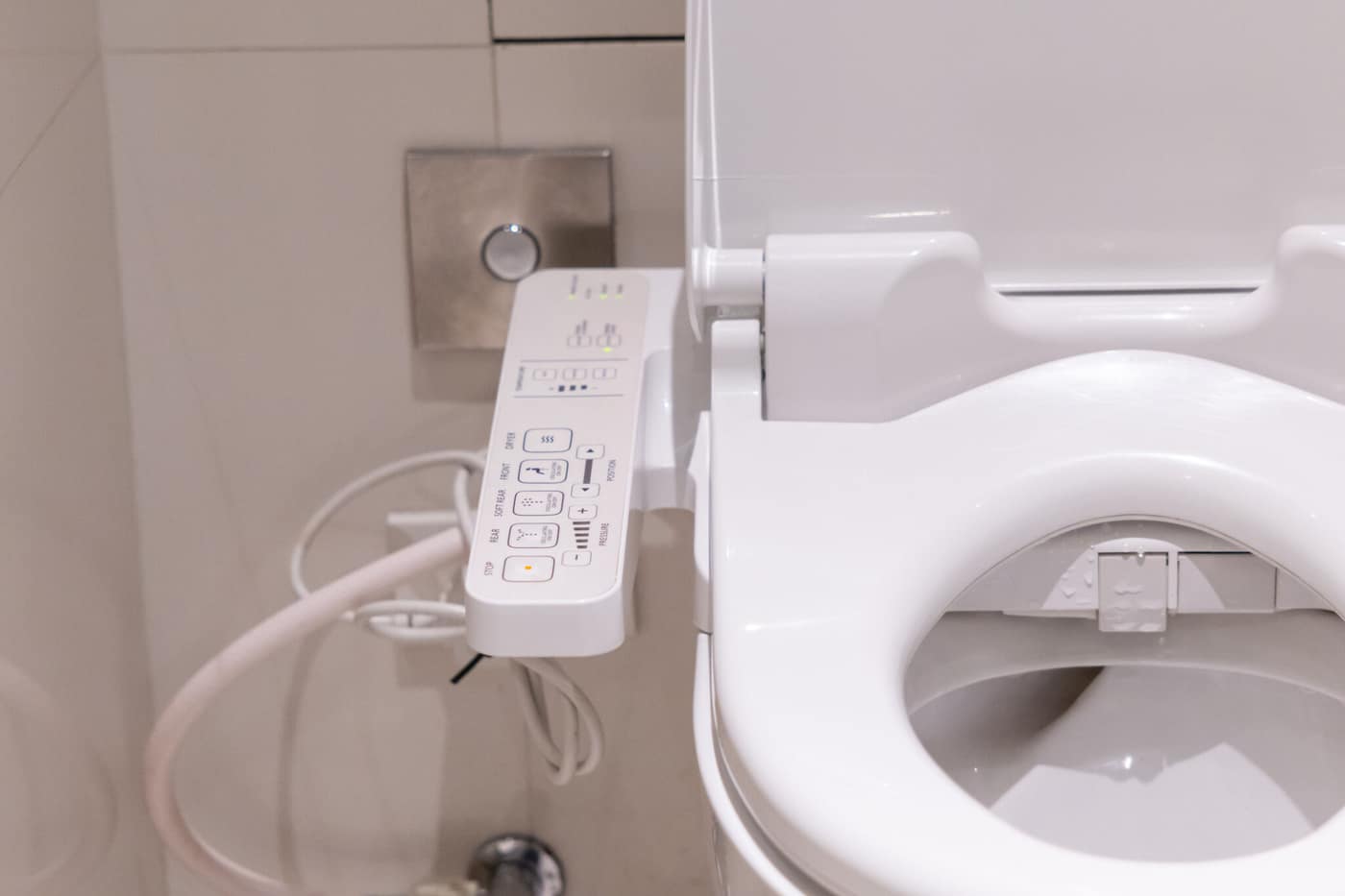 Toilet bidet seat install.