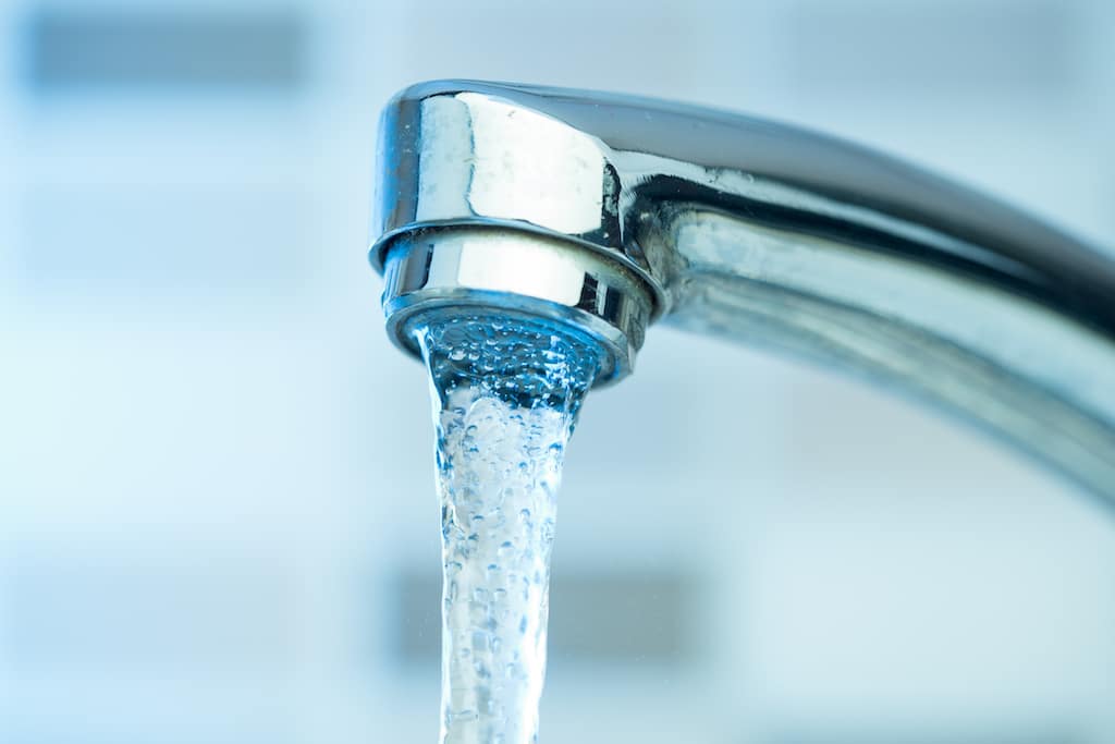 Pouring water from a Faucet high quality and high resolution studio. Bathroom sink replacement