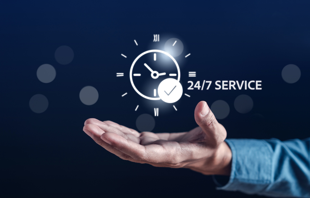 Hand holding digital icon of a clock and 24/7 service icon. | water softener