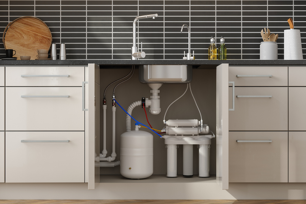 Water filtration system under kitchen sink. 