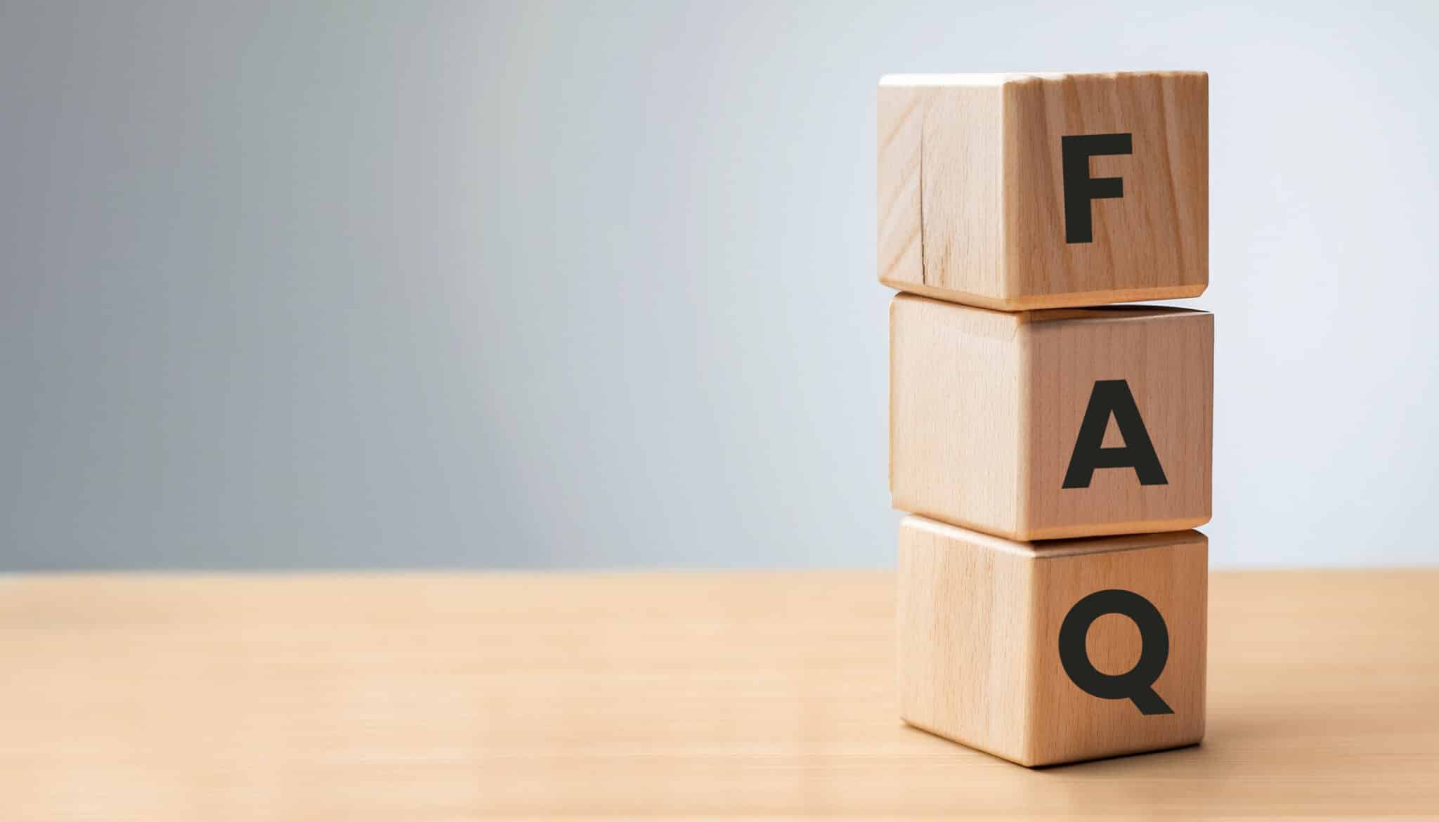 The letters faq business conceptual word collected of wooden cubes with copy space, Sump Pump Maintenance.