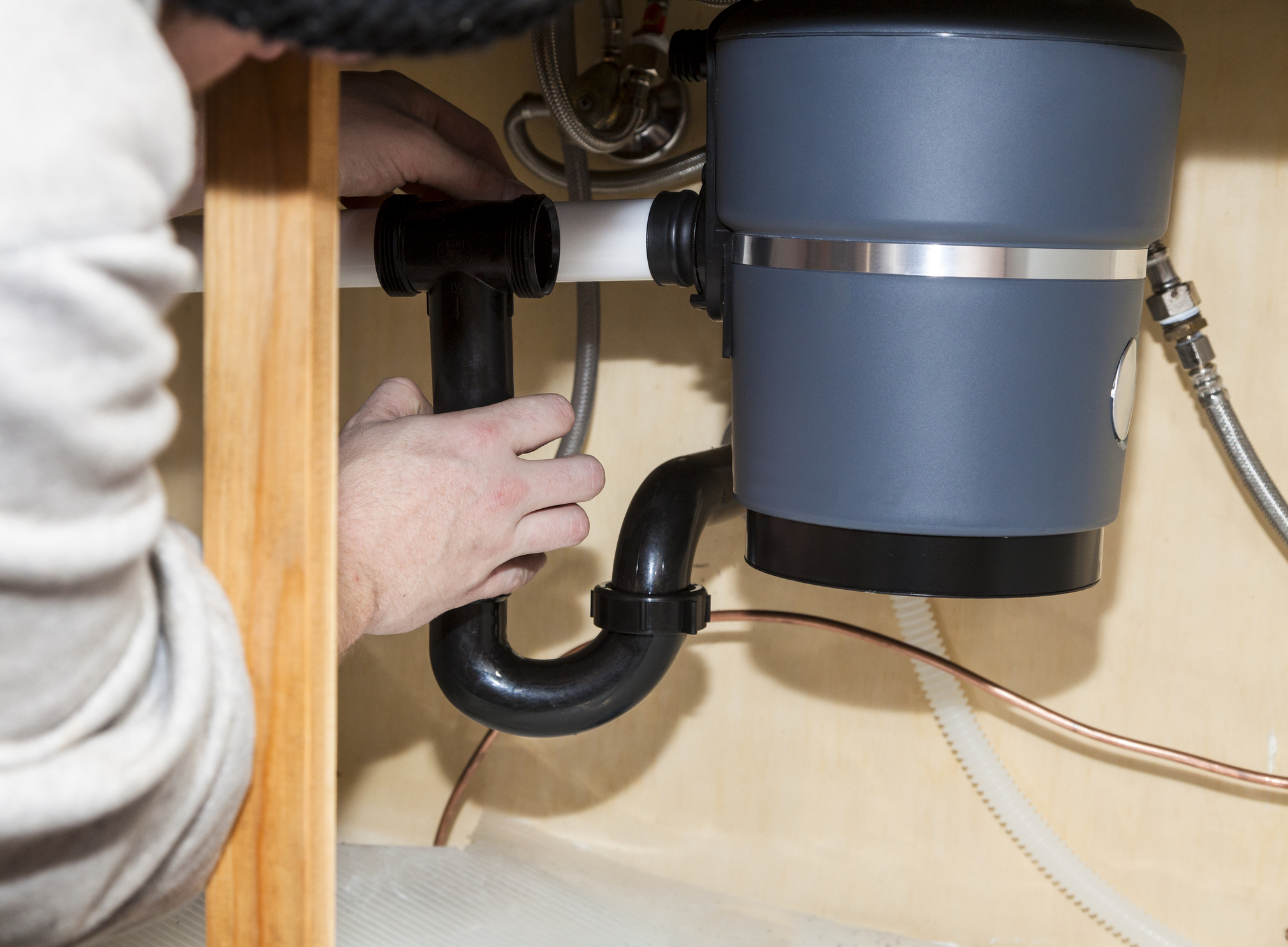 Garbage disposal installation done right by a professional plumber.