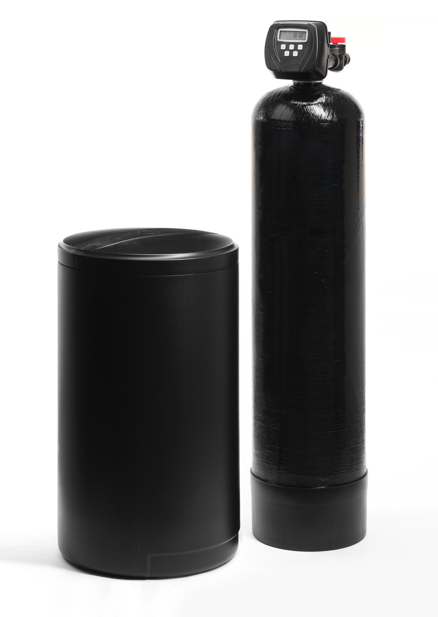 High efficiency water softeners and a brine tank on white.