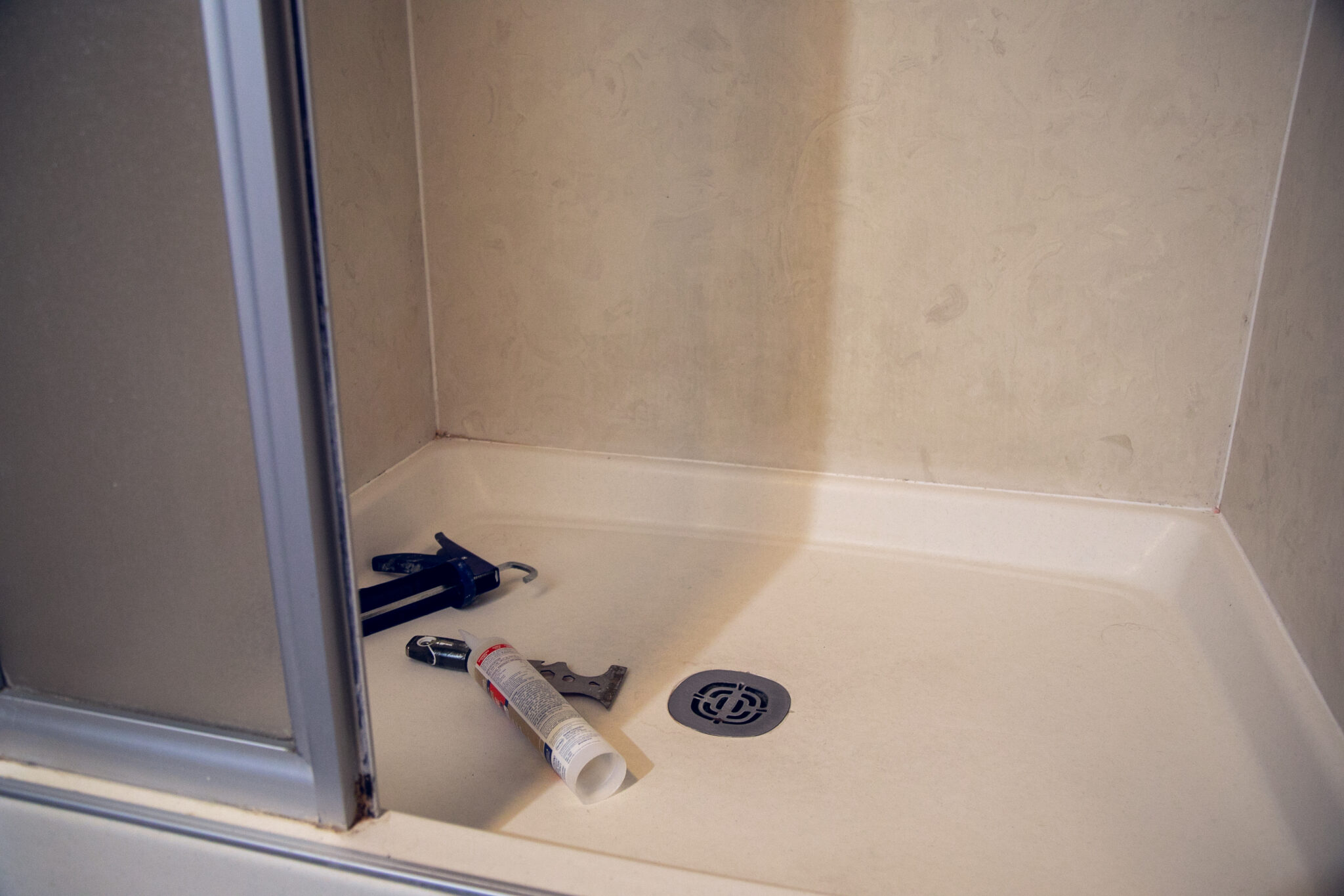 Fixing bathroom shower pan leak.